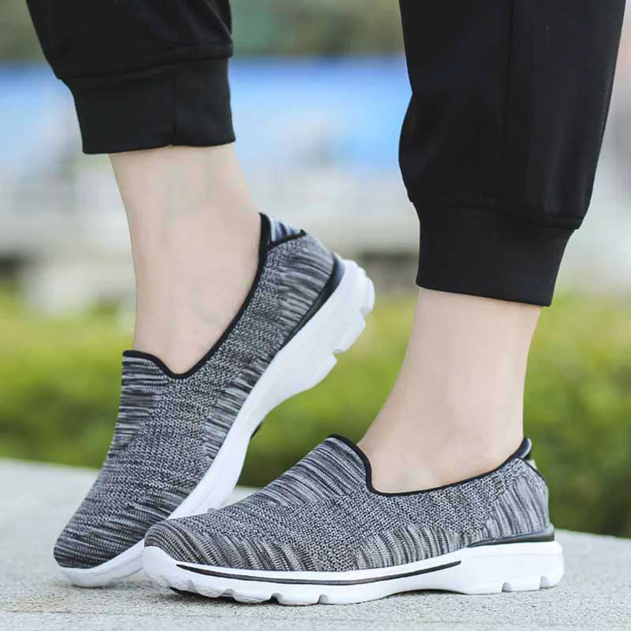 Black stripe pattern flyknit slip on shoe sneaker