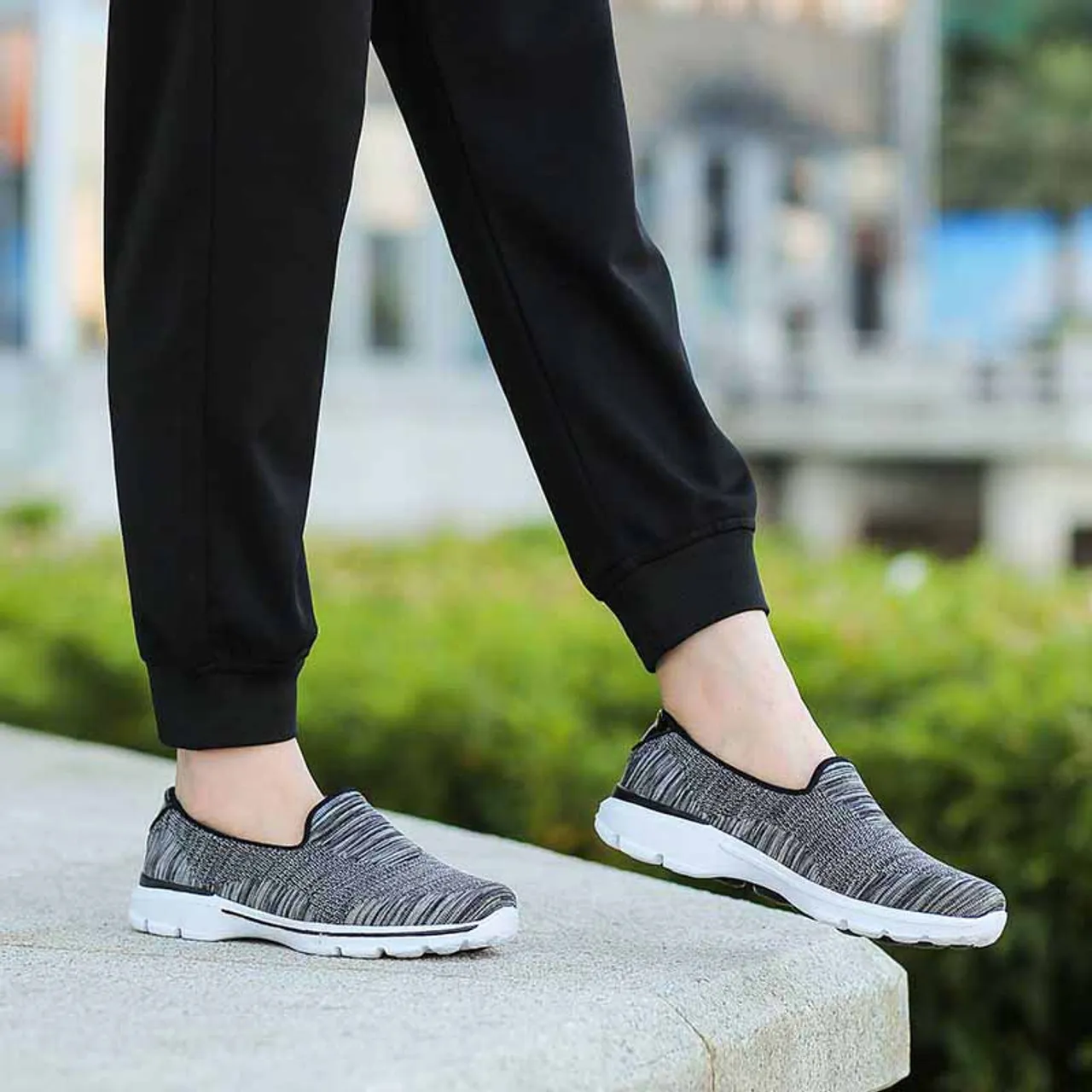 Black stripe pattern flyknit slip on shoe sneaker