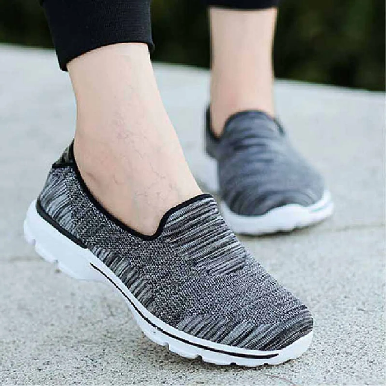 Black stripe pattern flyknit slip on shoe sneaker